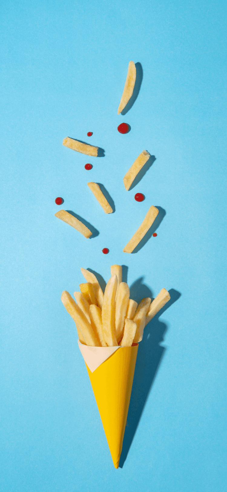 Magic Retouch removing extra fries and ketchup drops around a cone